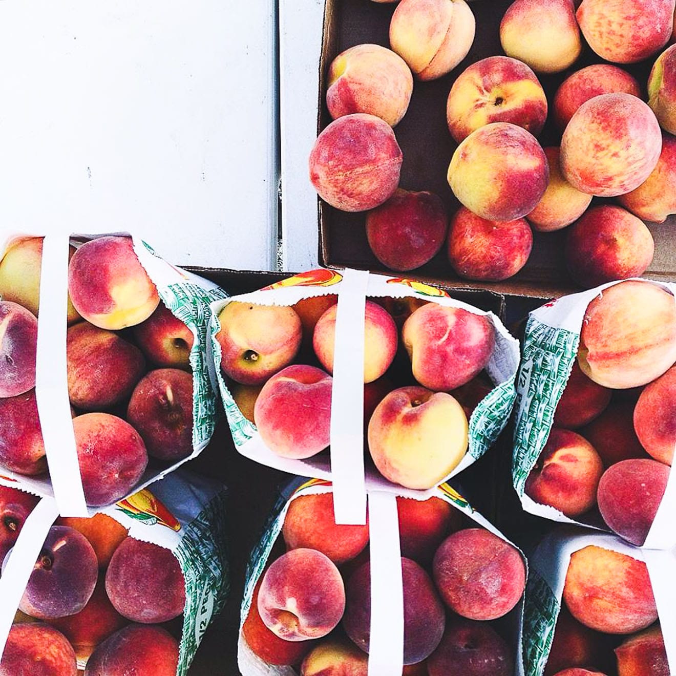 peaches in farm bags