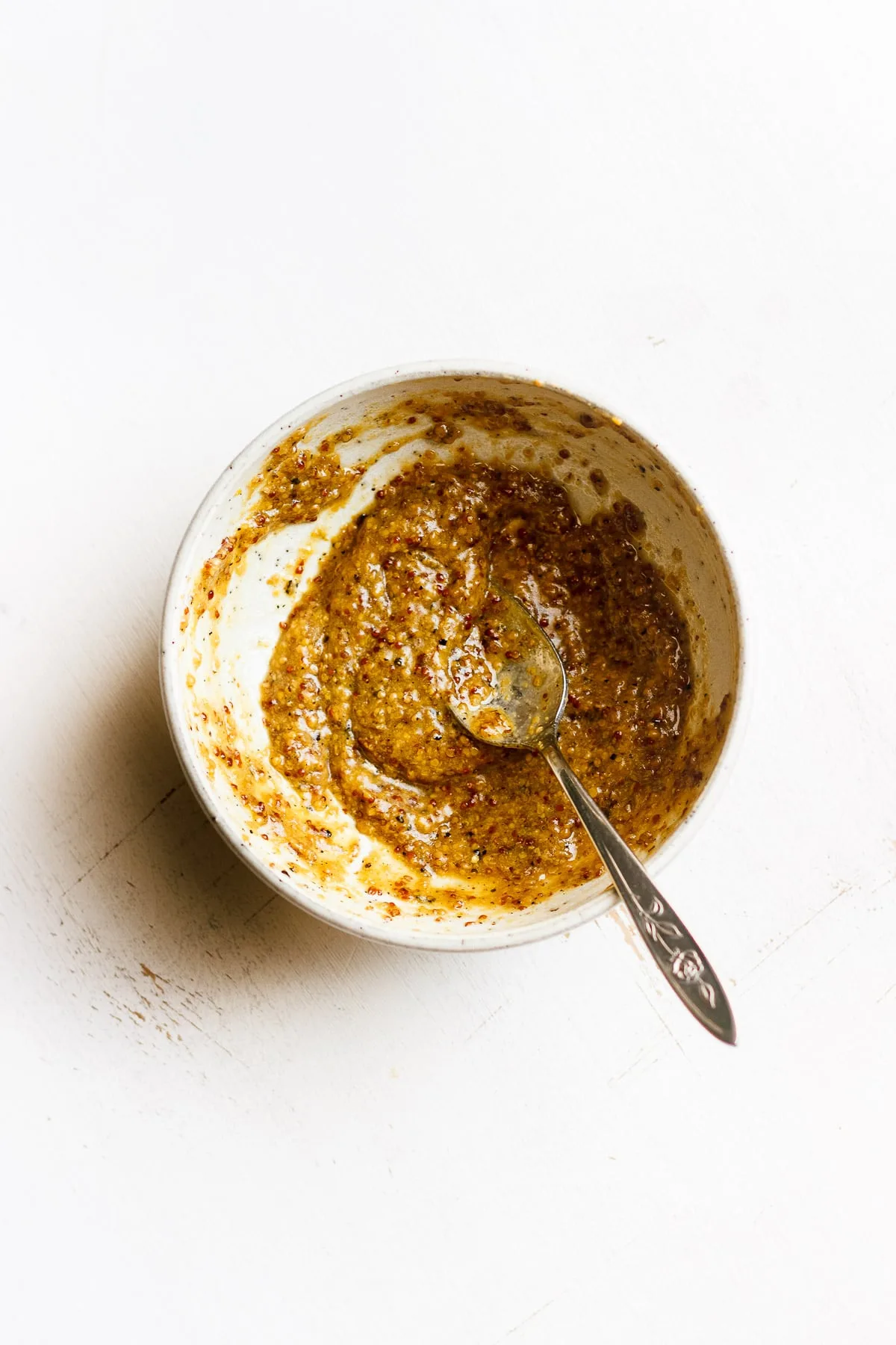 grainy mustard dressing in a bowl