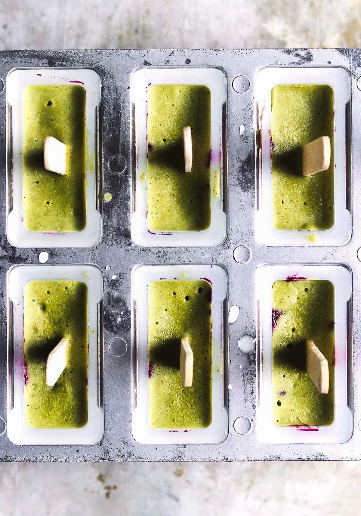 matcha popsicles in popsicle mold