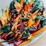 Roasted Vegetable Salad with Garlic Dressing + Toasted Pepitas | A simple and hearty roasted vegetable salad tossed in a garlic dressing and topped with toasted pepitas. A roasted vegetable salad for fall or all seasons.