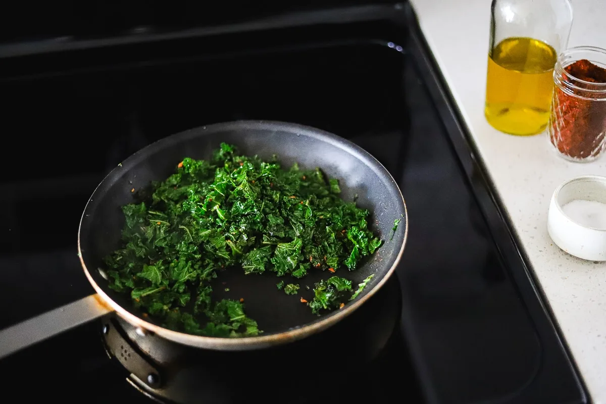 kale simmering in a pan