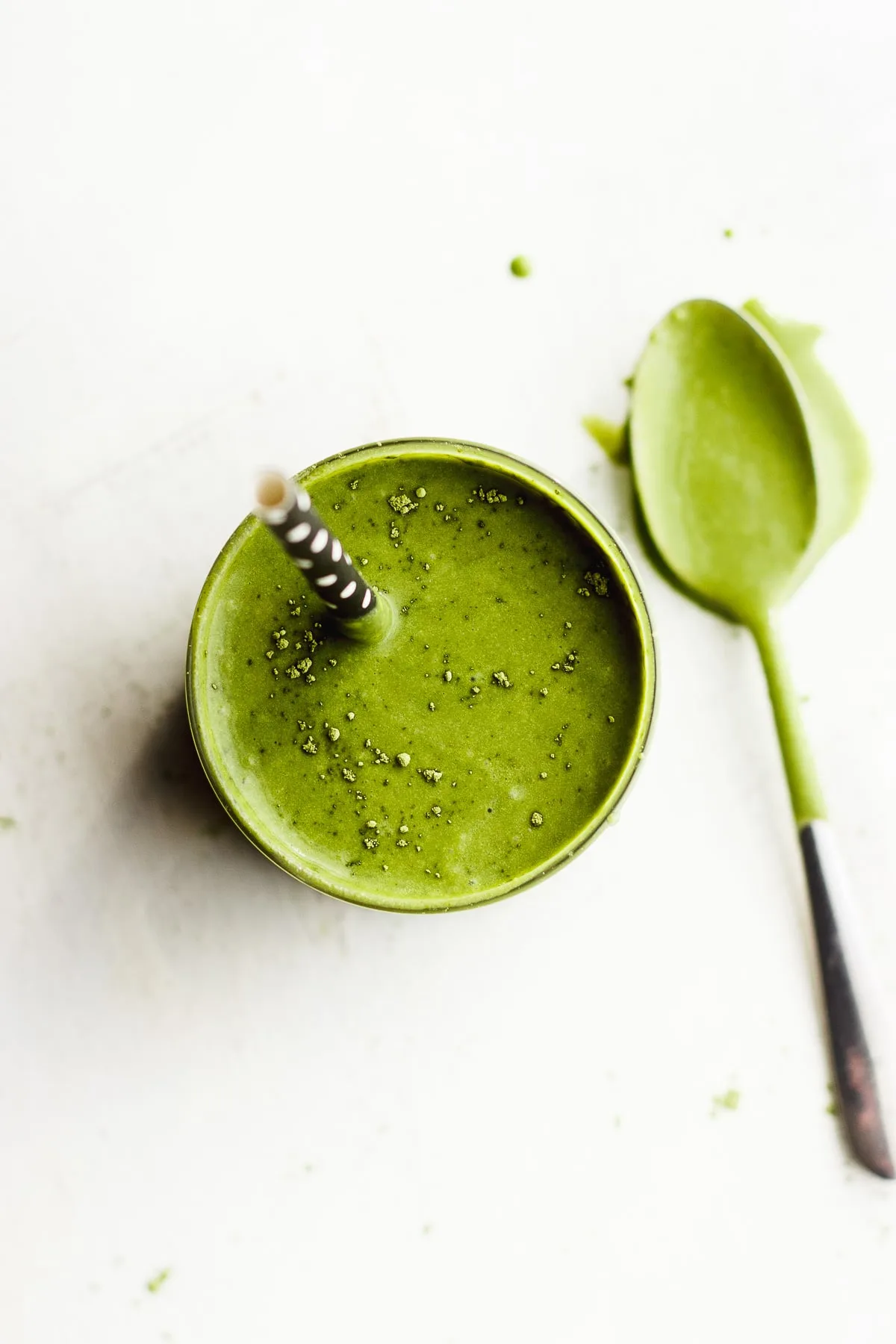 matcha shake in glass with spoon