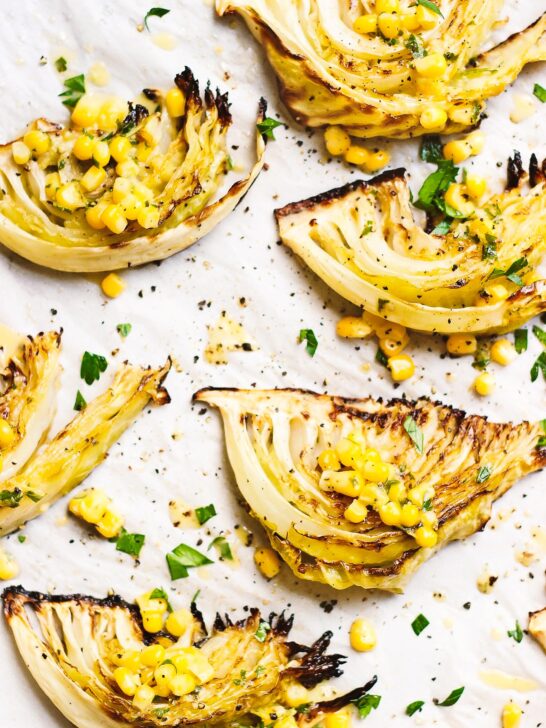 Roasted Cabbage with Sweet Corn + Spicy Vinaigrette | Roasted cabbage wedges with sweet corn and a roasted, spicy vinaigrette is an easy, satisfying summery meal. Naturally gluten-free and vegan.