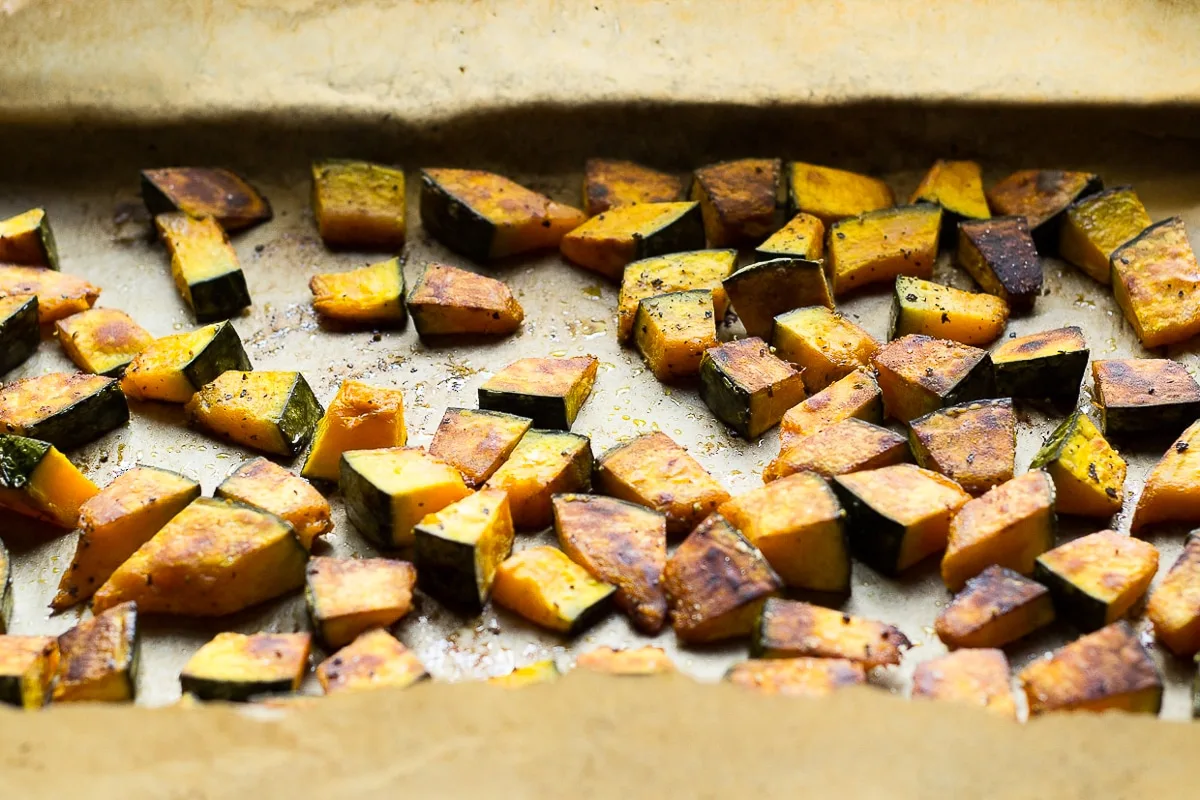 roasted kabocha squash on a sheet pan