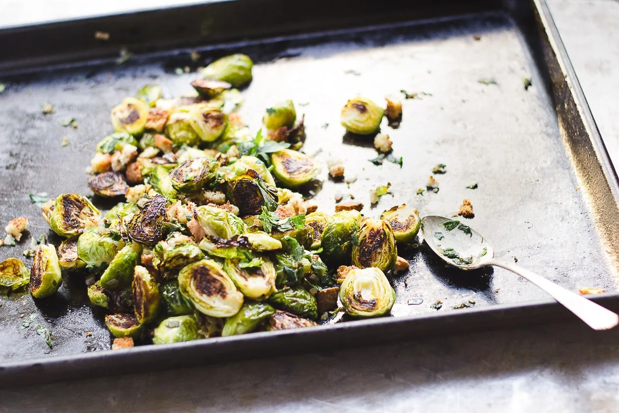 brussels sprouts with bread crumbs on a tray