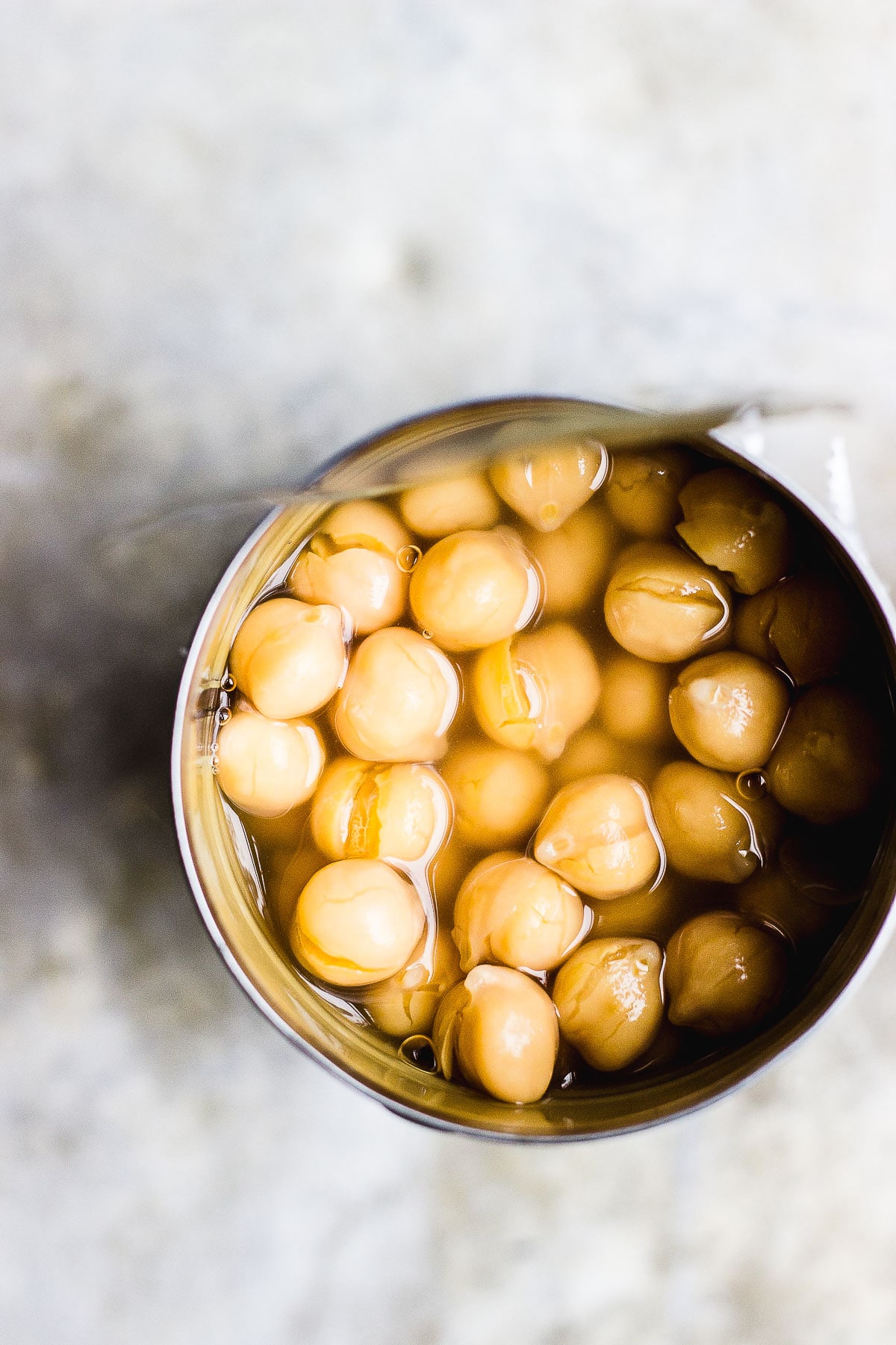 an opened can of chickpeas