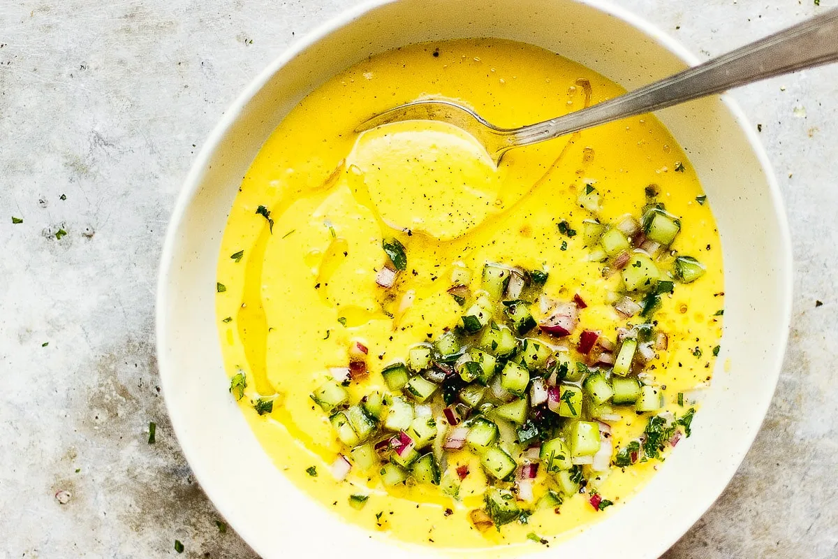 yellow soup in bowl
