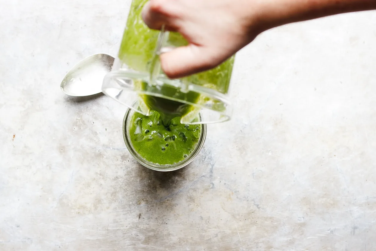 fall green smoothie poured with blender