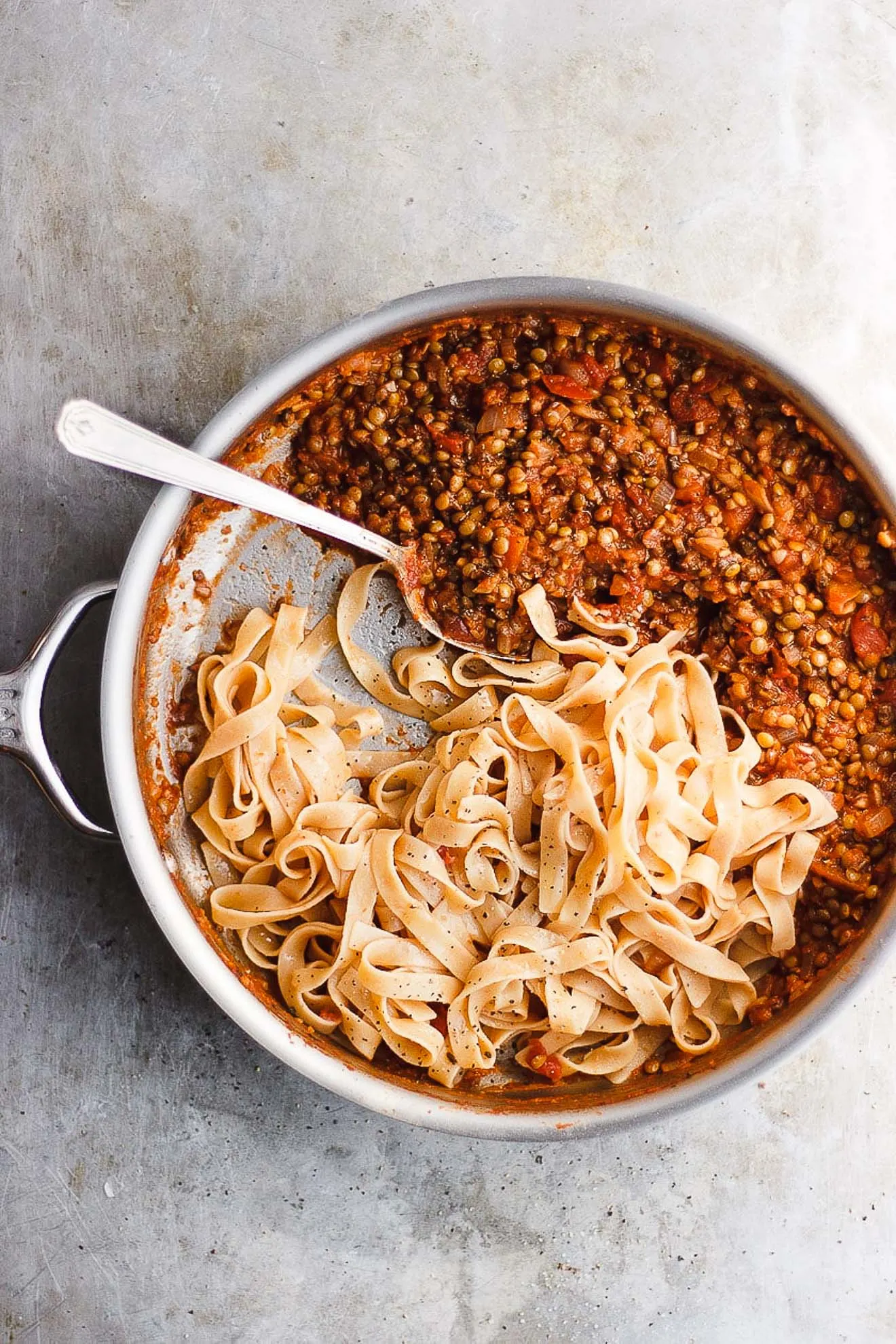  lentil bolognese sauce with tagliatelle in a pan