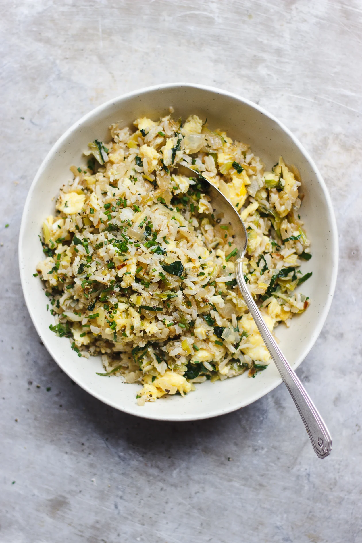 All of the Alliums Fried Rice | With Food + Love | Vegetarian and naturally gluten-free fried rice with all of the alliums fried a touch of ginger and kale from Molly Yeh's new book Molly On The Range.