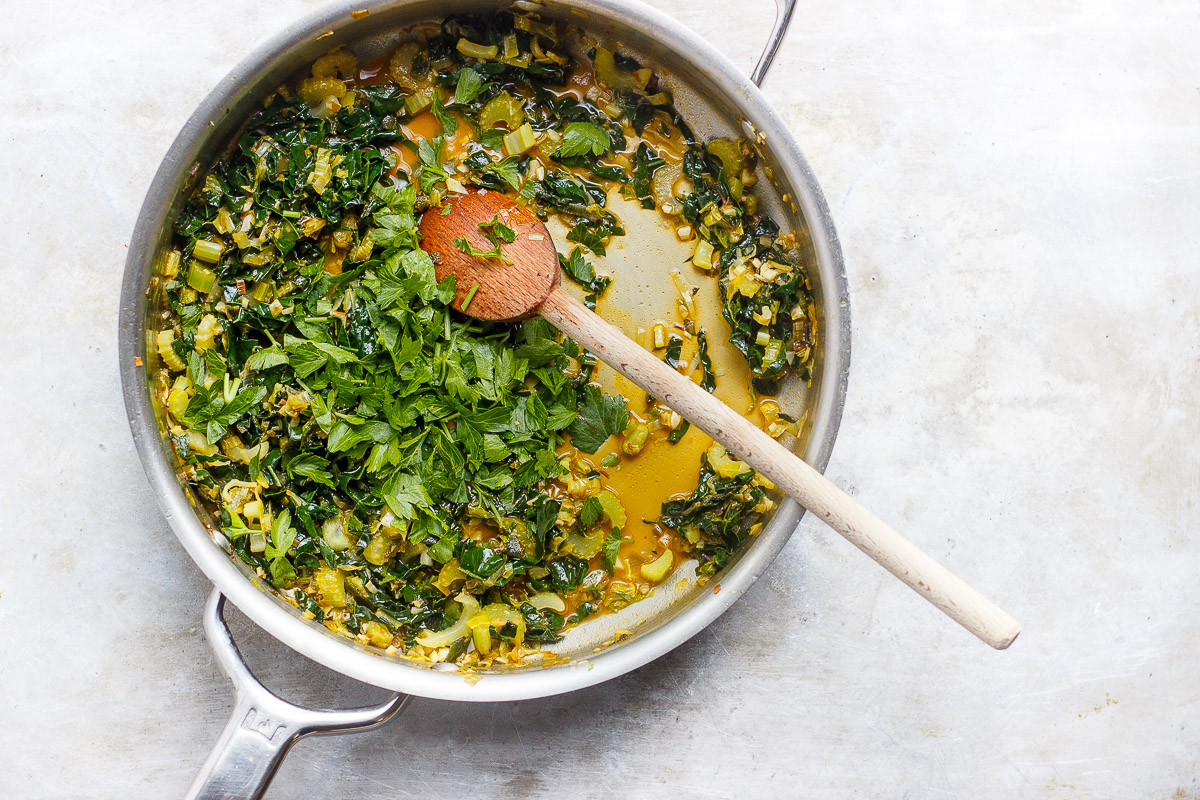 stuffing ingredients in a skillet