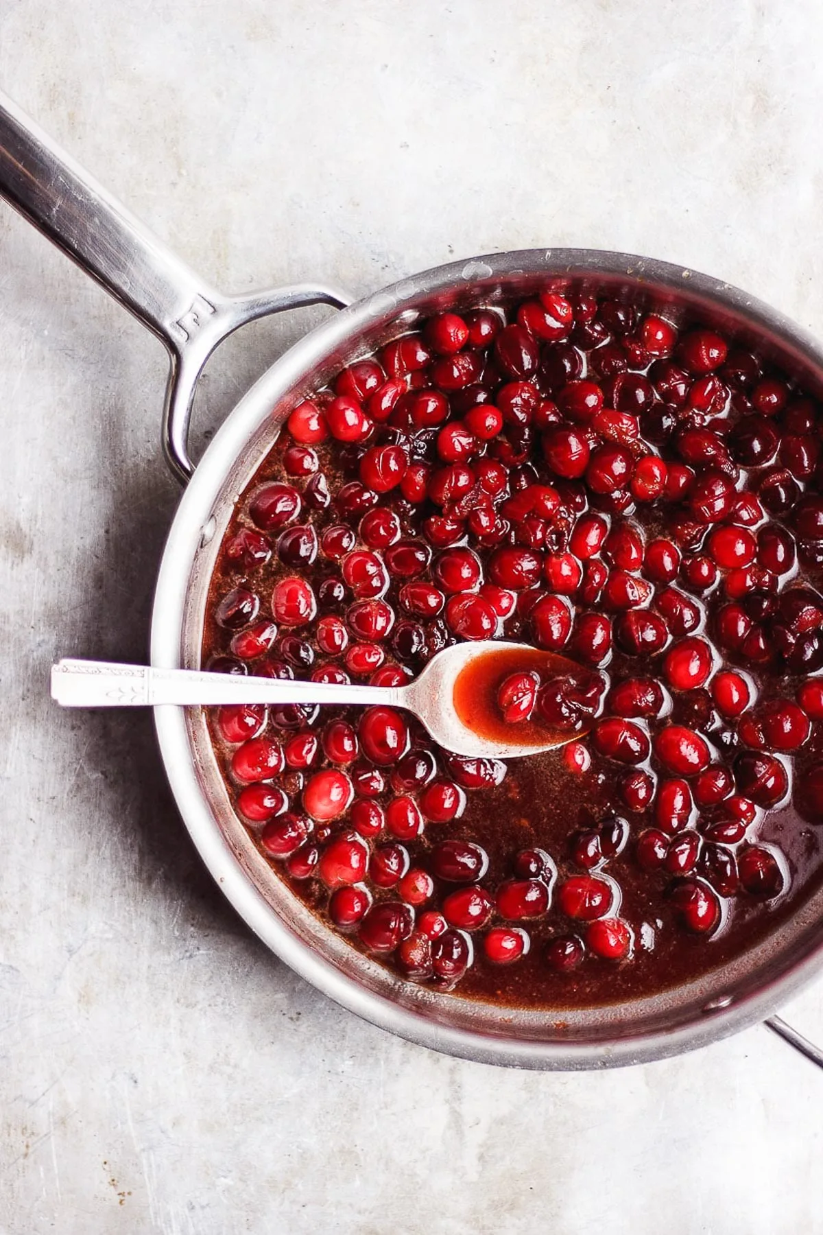 cranberries cooking in a pan