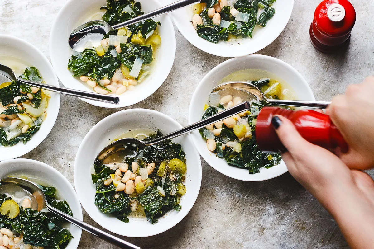 bowls of beans and greens