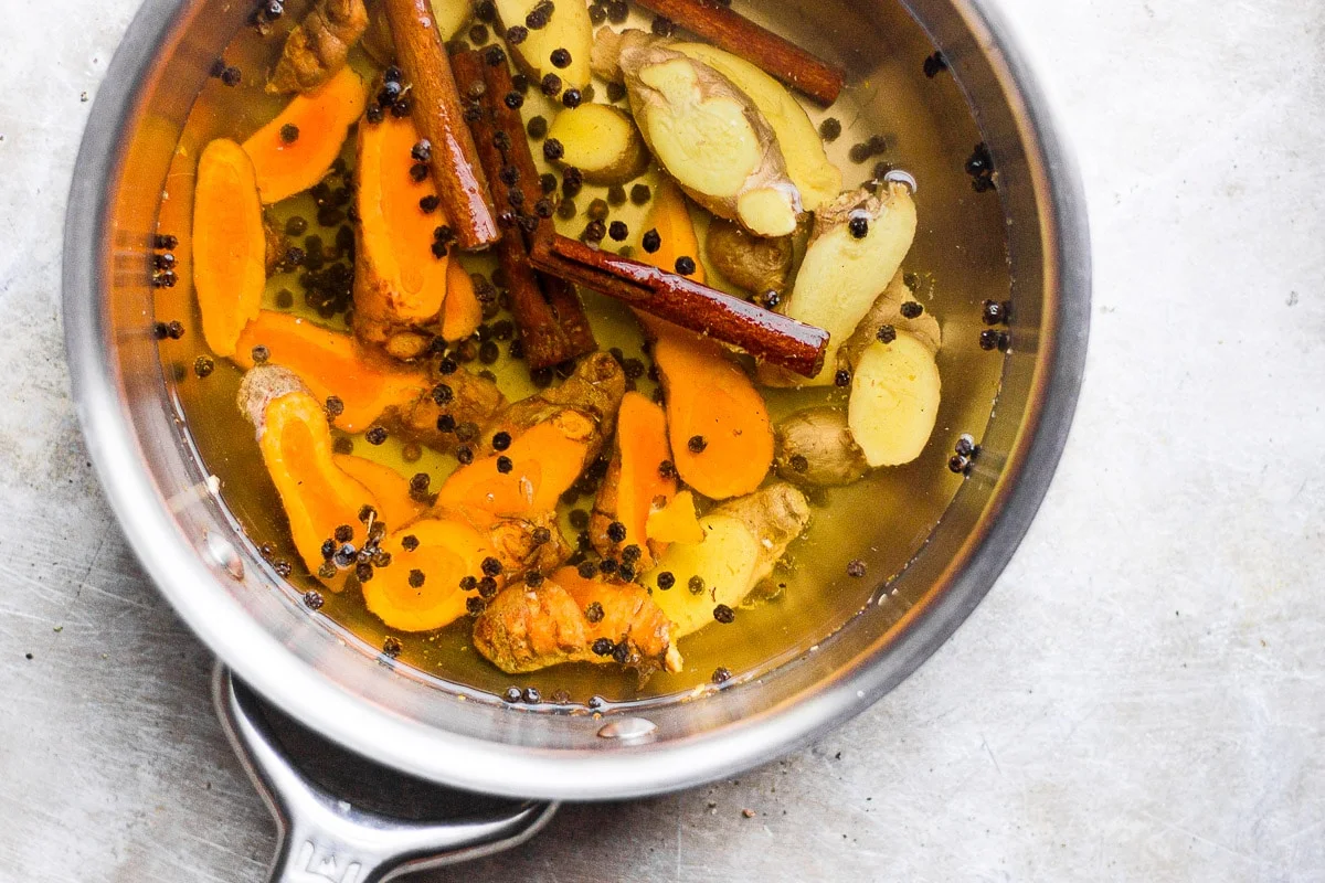 turmeric and ginger in a pan