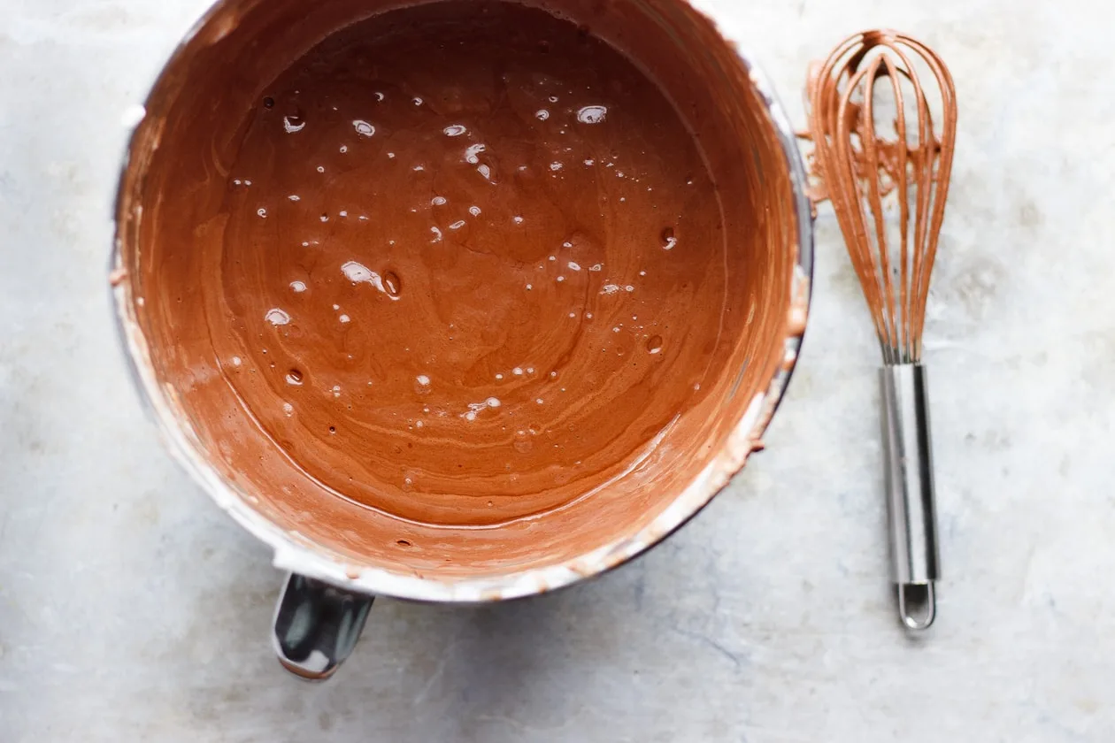 making vegan chocolate mousse in a mixing bowl