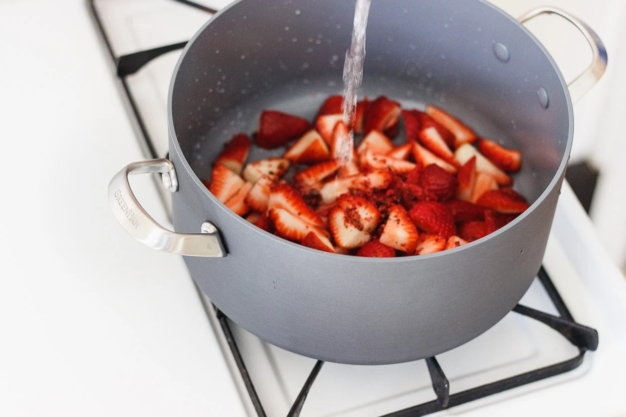 strawberries in pot on the stove