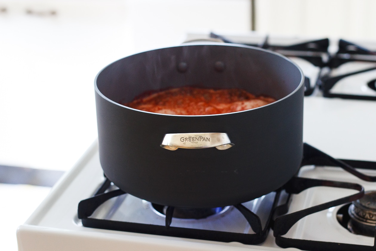 strawberries simmering in pot on the stove