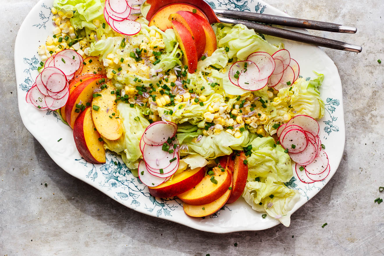 Summer Butter Lettuce Salad with Peaches + Sweet Corn | A fresh, summery, delicate butter lettuce salad with peaches, sweet corn and a light lemon agave dressing. An easy salad with loads of flavor and crunch. 