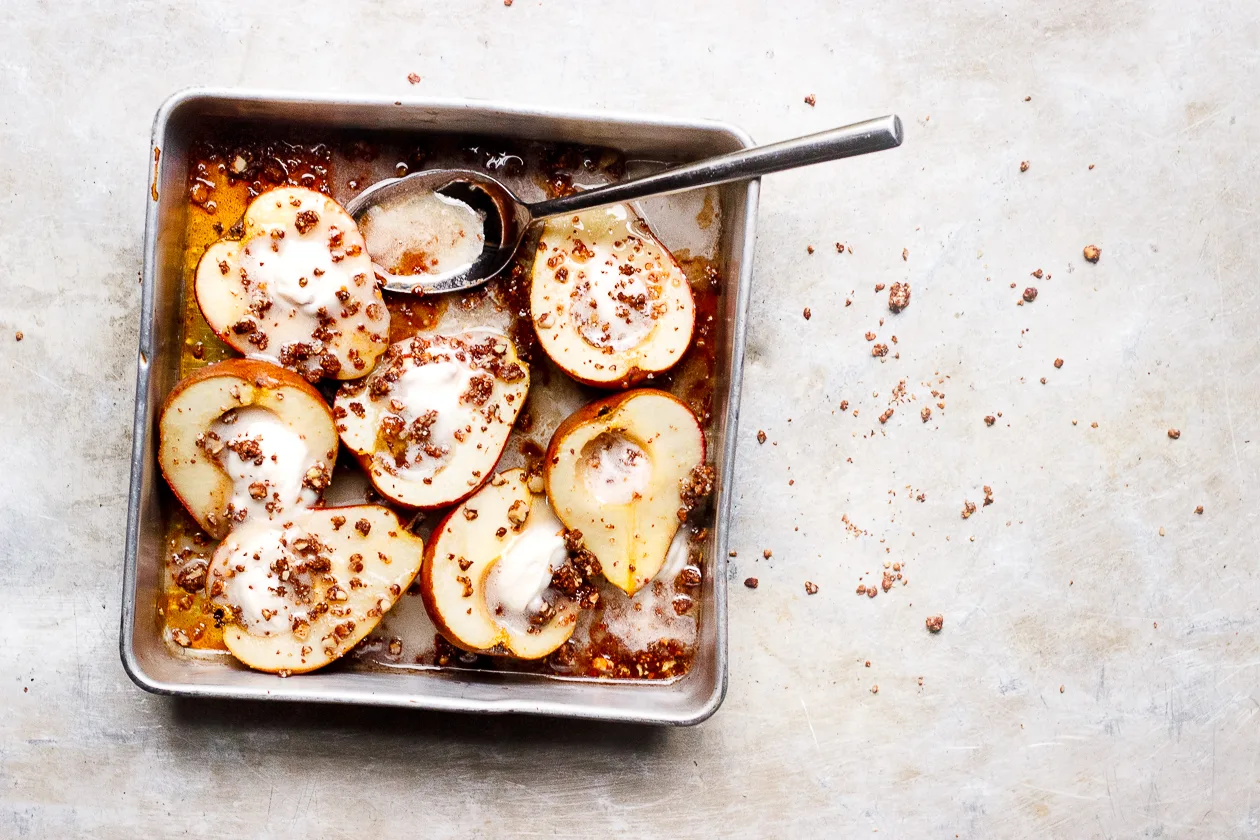 Maple Baked Pears with Chocolate Crumble + Coconut Cream | Maple baked pears with an easy crispy, chocolaty crumble topping. A vegan, refined sugar-free, gluten-free fall pear dessert.