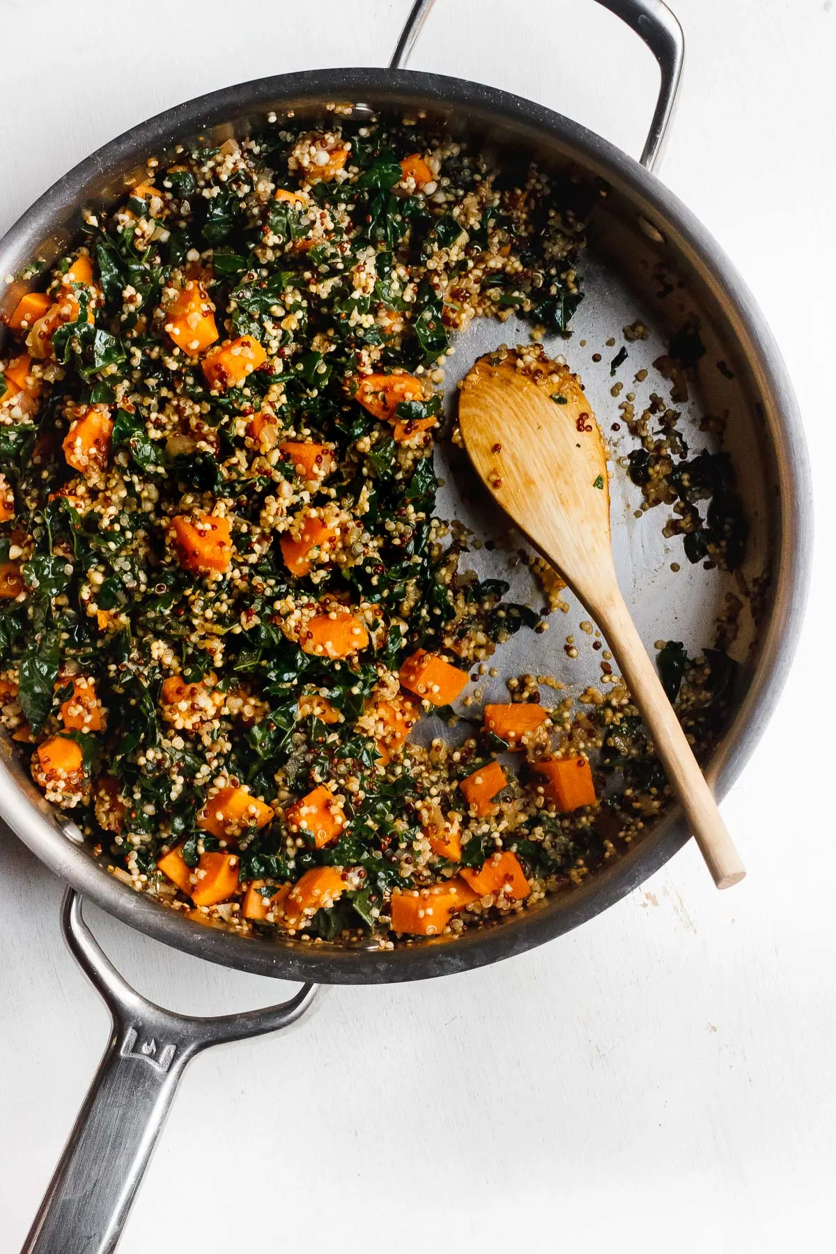 sweet potato kale and quinoa in a pan