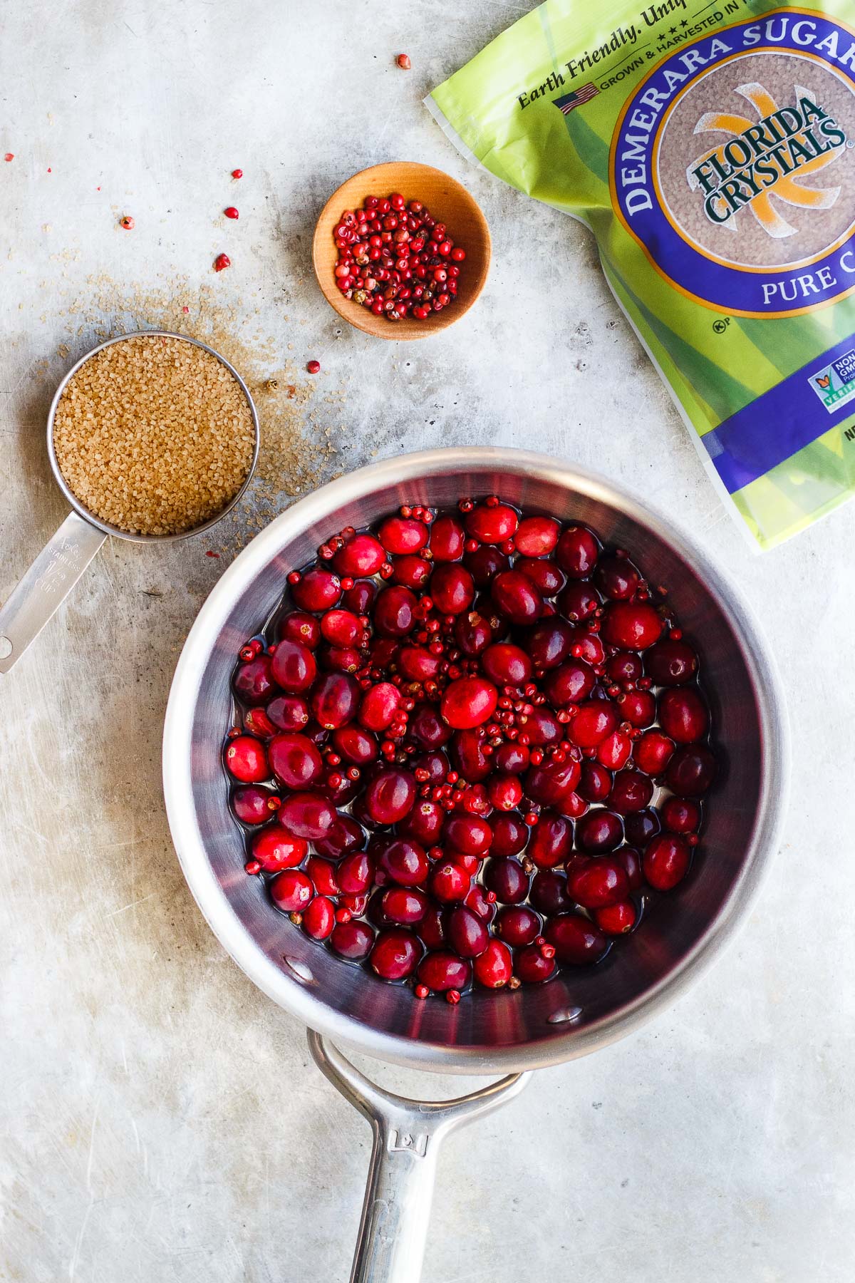 cranberries in a pot with sugar