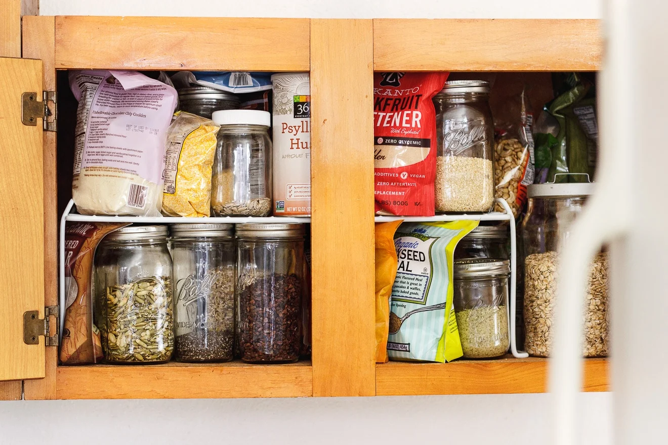 messy unorganized pantry shelf