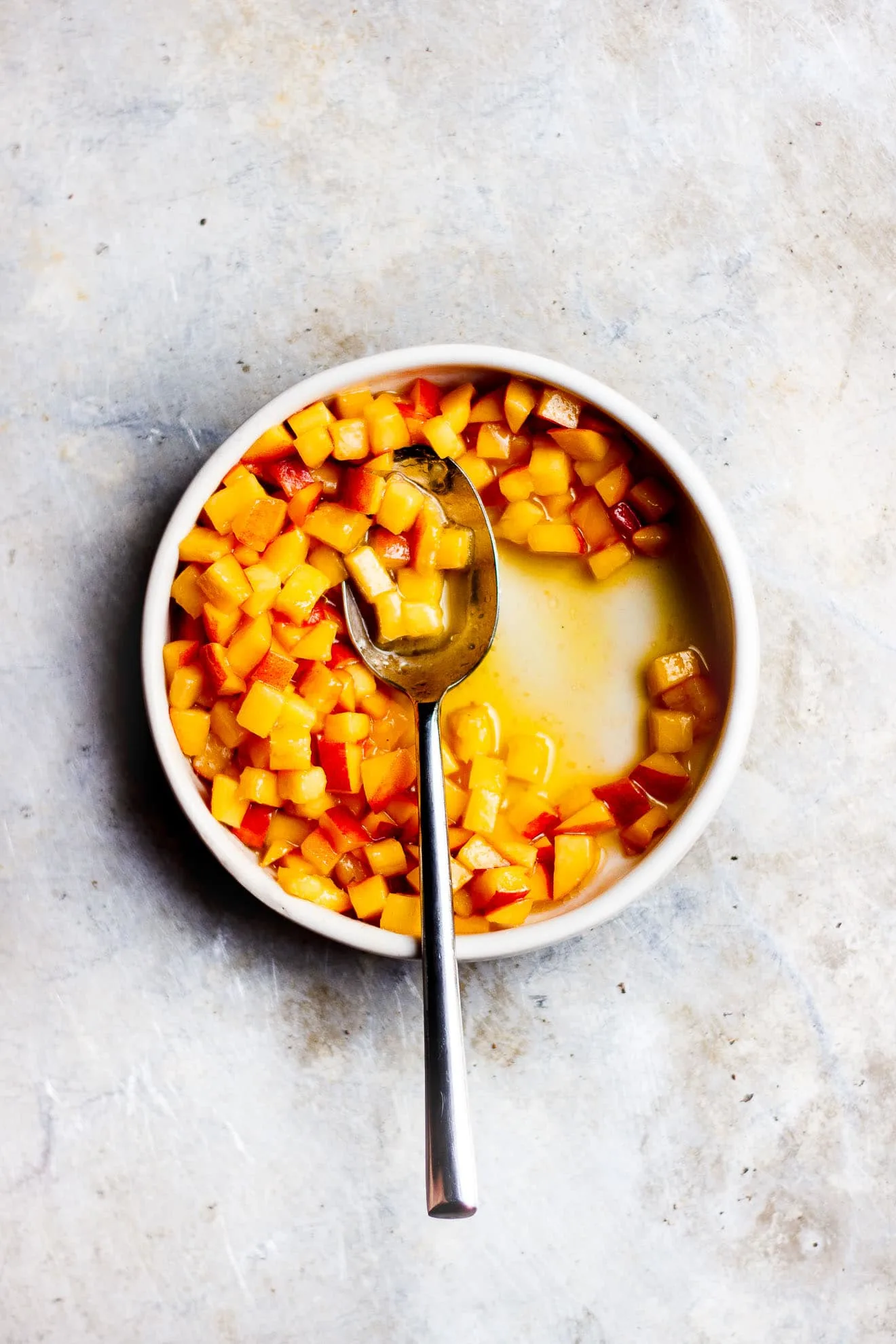 salty peaches in a bowl