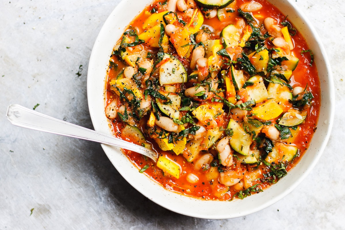 stew zucchini with tomato sauce in a bowl