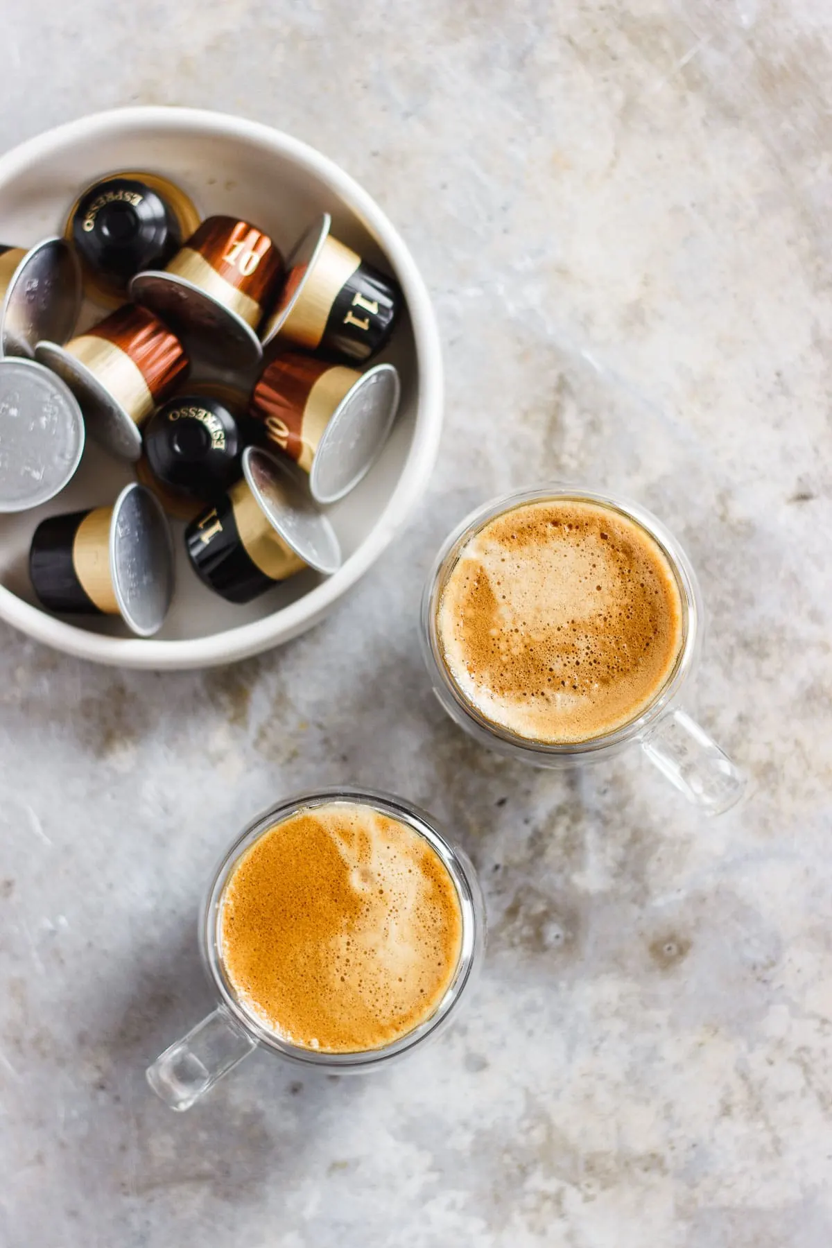 A dirty chai martini naturally sweetened with maple and balanced with a pinch of pink Himalayan salt. Made creamy with almond milk for a vegan cocktail. #dirtychaimartini #dirtychai #espressomartini