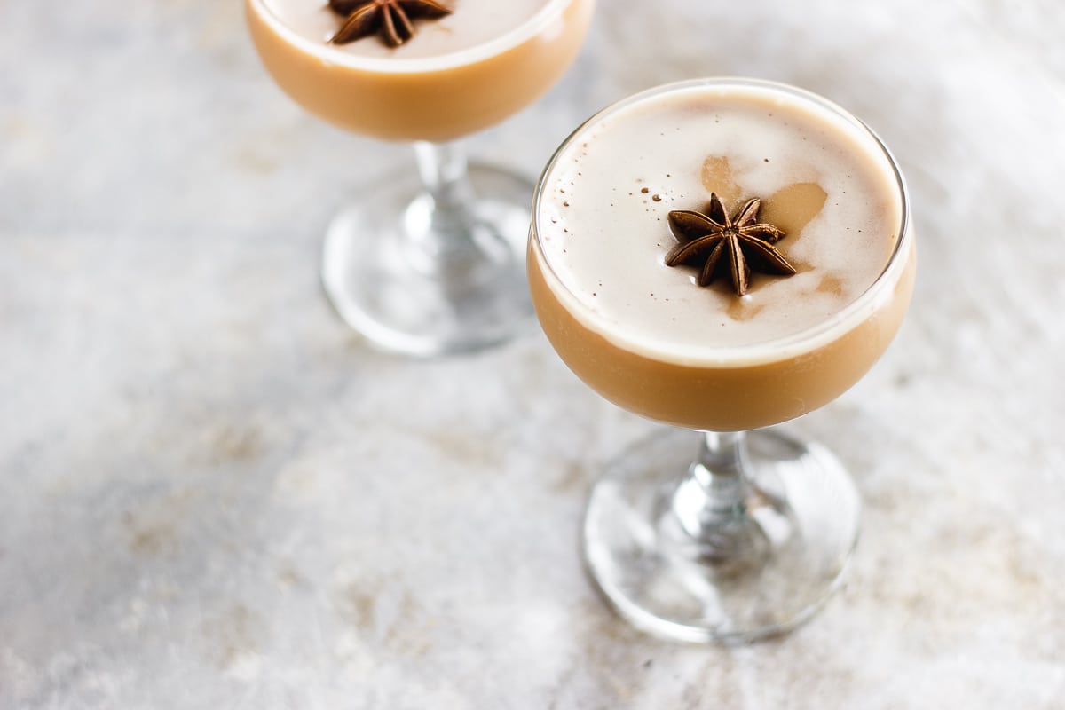 A dirty chai martini naturally sweetened with maple and balanced with a pinch of pink Himalayan salt. Made creamy with almond milk for a vegan cocktail. #dirtychaimartini #dirtychai #espressomartini