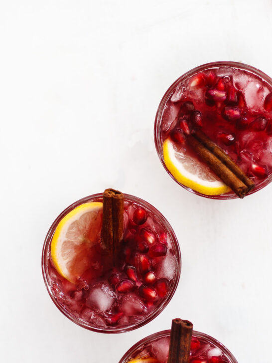 Sweet Tea Sangria with Cinnamon and Pomegranate | Sweet tea sangria lightly spiced with cinnamon and flavored with bright notes of pomegranate and citrus. A four ingredient, beautiful and festive sangria. #holidaysangria #sweetteasangria