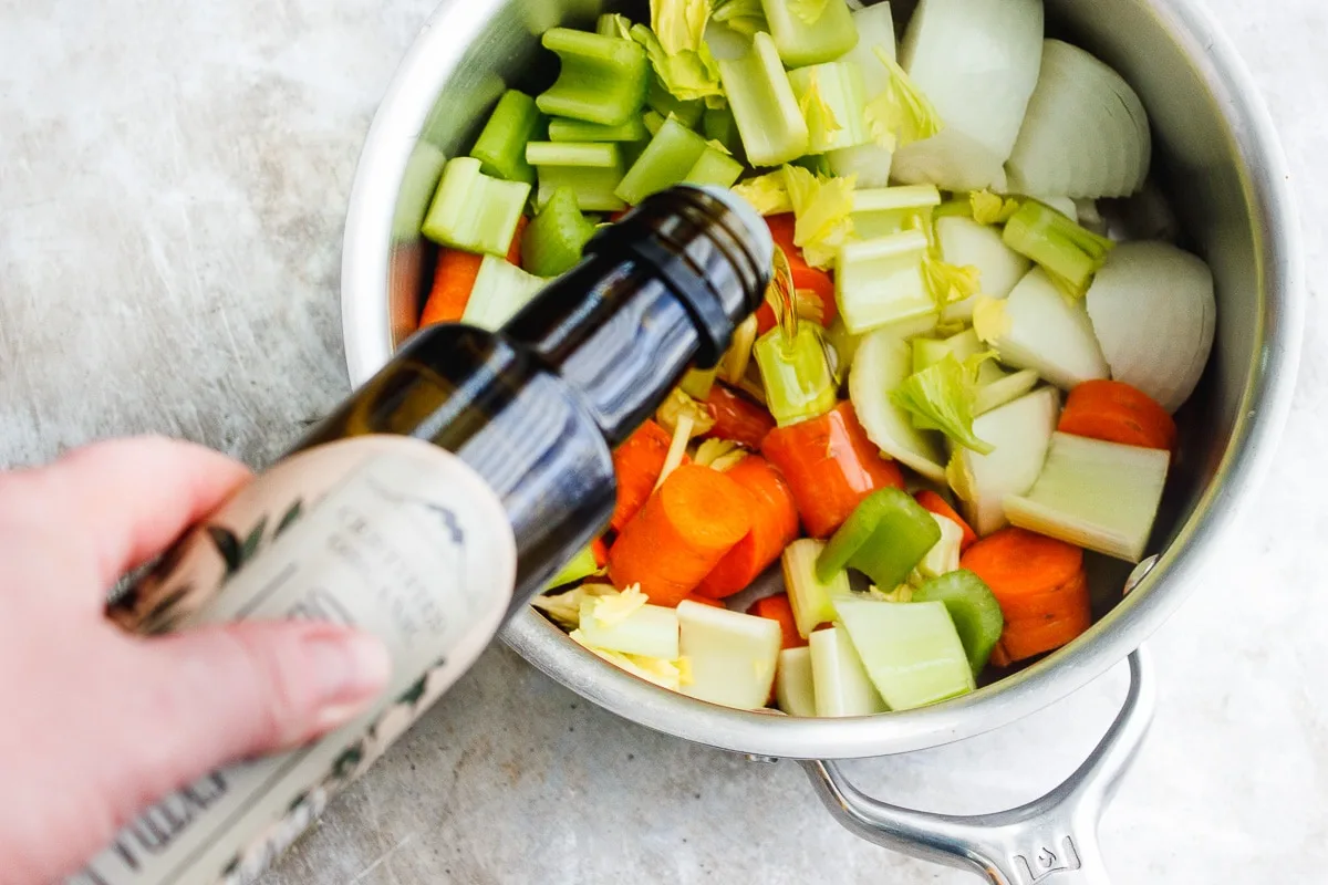 A healing, soothing, restorative vegetable broth flavored with bay leaf and peppercorn. A vegan, nutrient-dense sipping broth or for using in recipes. #veganbroth #vegetablebroth #bayleafrecipes #restorativebroth #sippingbroth