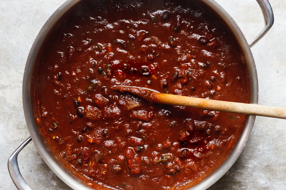 vegan chili in pot with spoon
