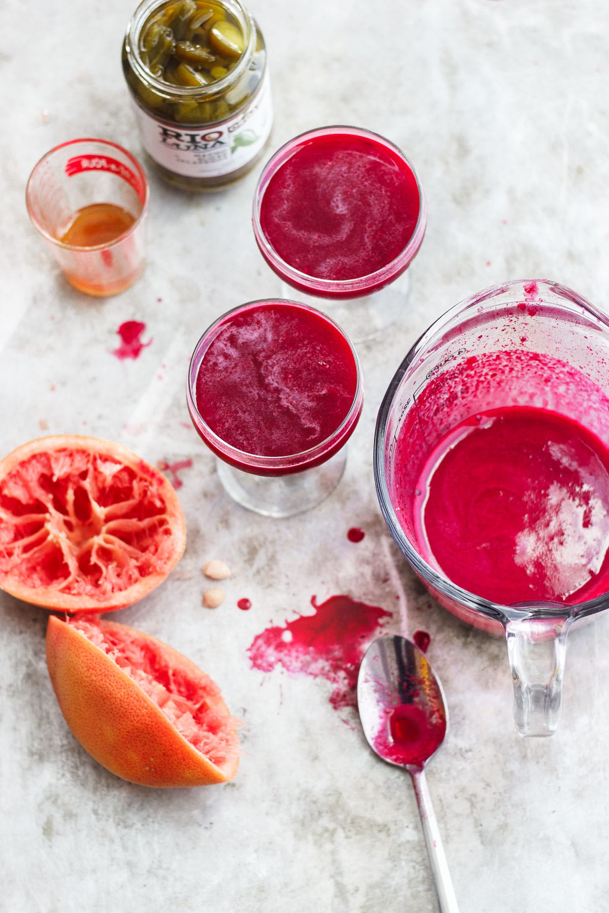 bright pink cocktail with grapefruit