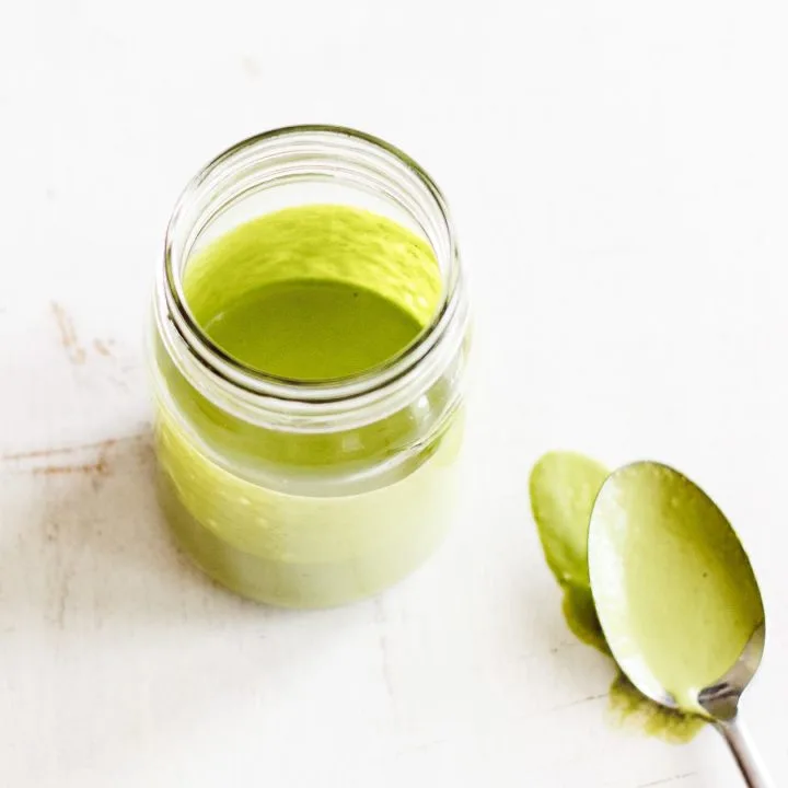 vegan green goddess sauce in a jar