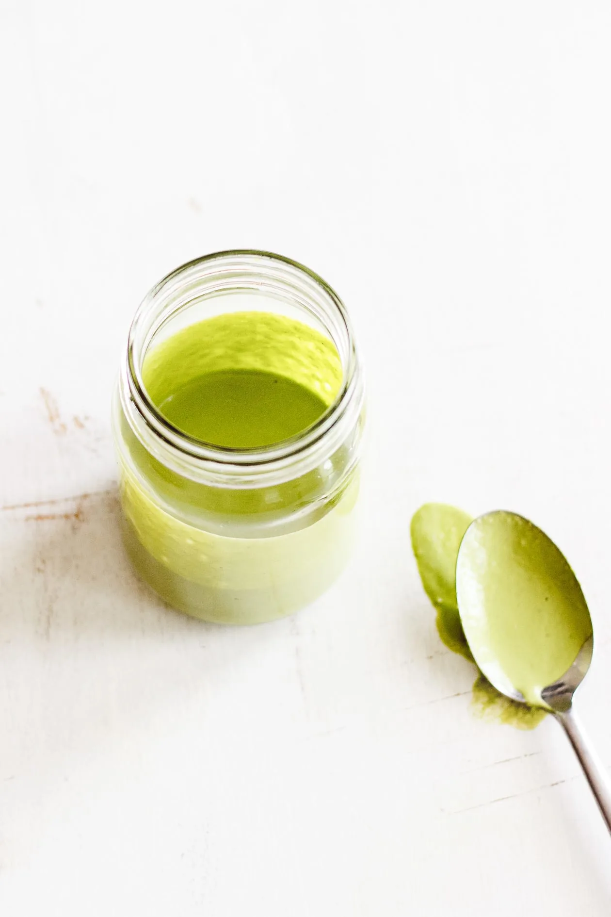 vegan green goddess sauce in a jar