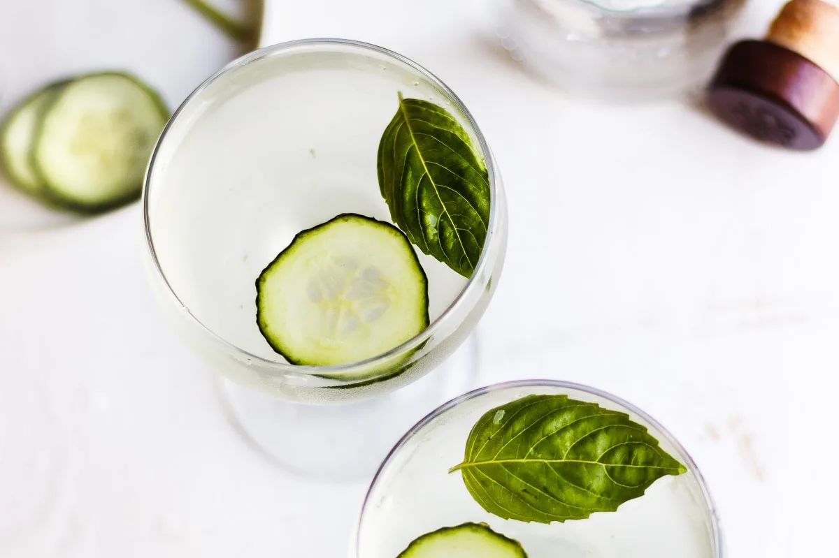 Cucumber Basil Martini with Red Salt a refreshing summer cocktail