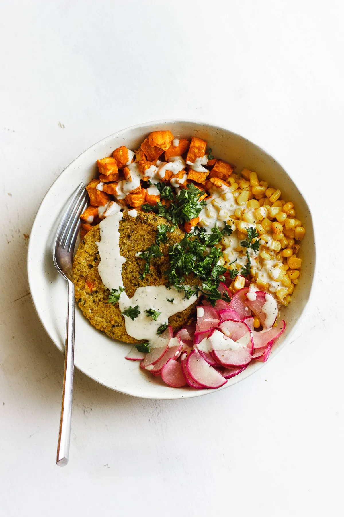 veggie burger bowl with vegetables 