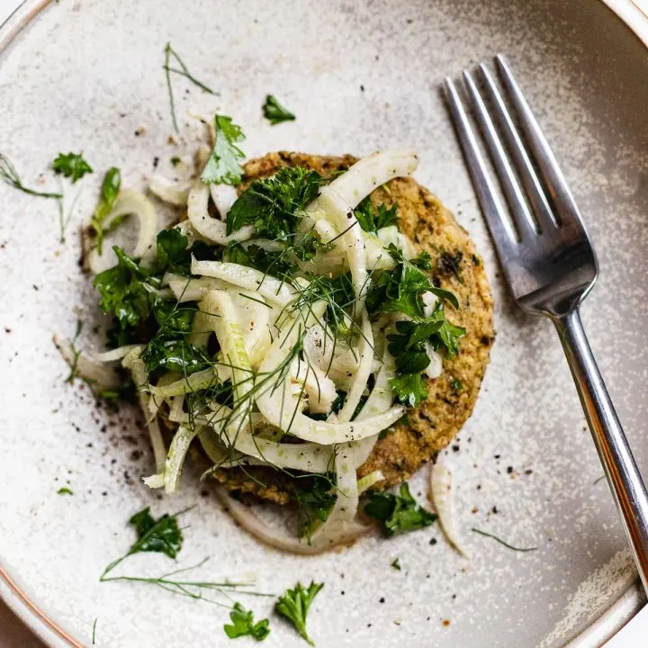 shaved fennel slaw on top of a veggie burger