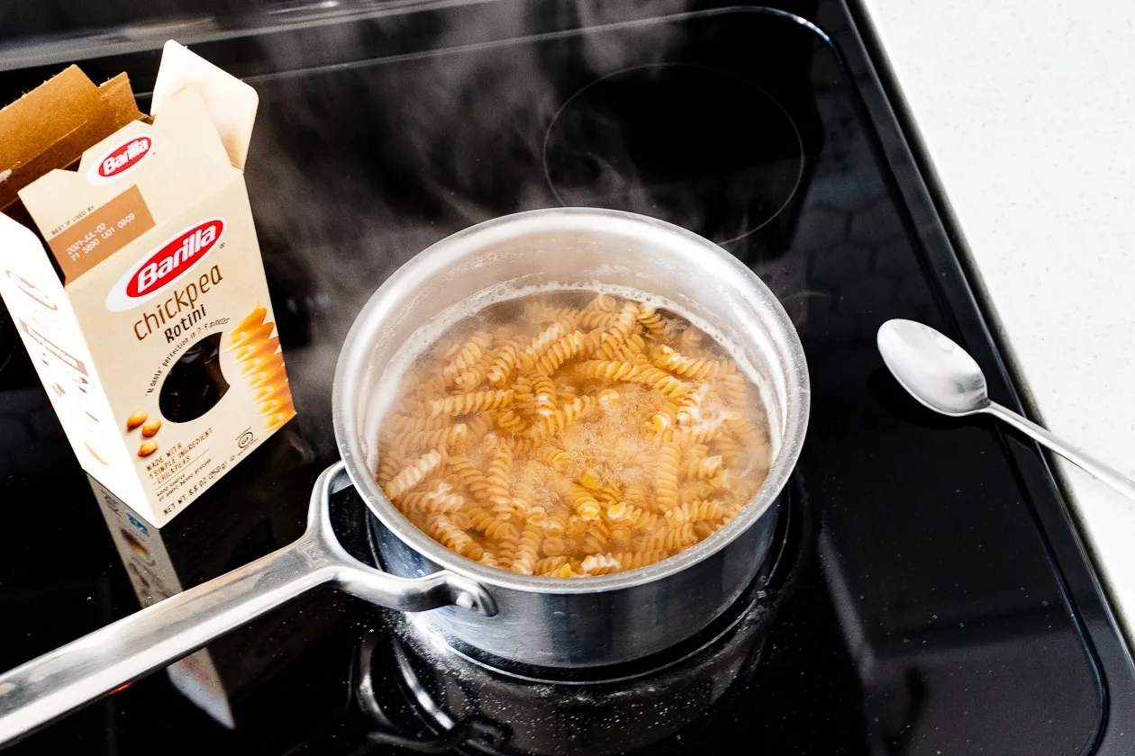 barilla pasta in a pot of boil water