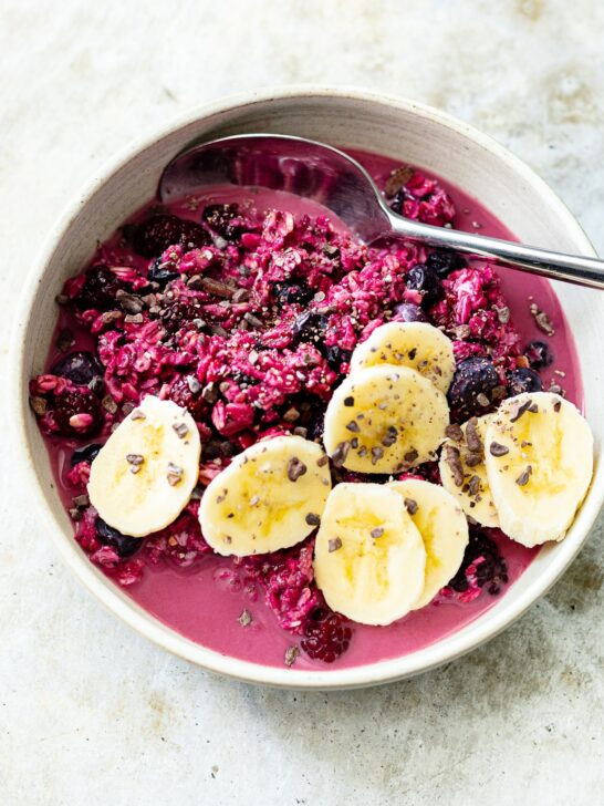 bowl of berry overnight oats with banana